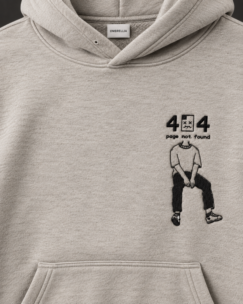 Ombrellia hoodie chest embroidery closeup with brand label